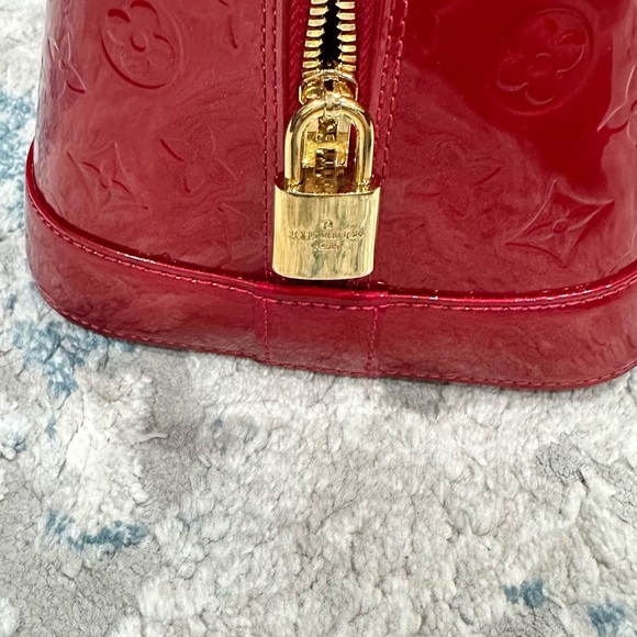 100% authentic LOUIS VUITTON ALMA LARGE LIKE NEW - Picture 11 of 11